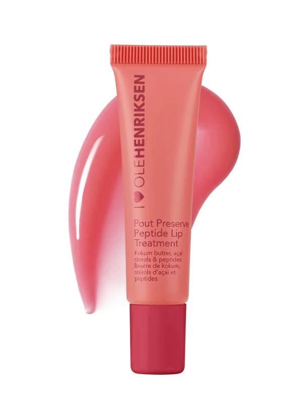 A tube of Ole Henriksen Pout Preserve Peptide Lip Treatment in Strawberry Sorbet, shown against a plain background