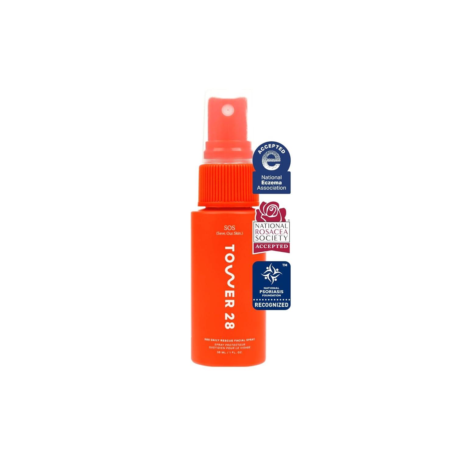 A small 1-ounce Tower 28 SOS Daily Rescue Facial Spray bottle with a fine-mist nozzle, featuring the brand's signature colorful label design